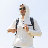 White Sands - Men's Sun Henley with Hideaway Hood worn with the hood up, studio view