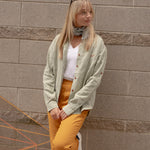 Woman wearing Joshua Tree - Women's Breathable Hemp Trail Pants in Orpiment (Turmeric) and Canyonlands - Women’s Long-Sleeve Ventilated Hemp Shirt in Agave (Light Green)
