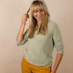 White Sands - Women's Long-Sleeve Hooded Henley in Agave (Light Green) (Front view with hood on)