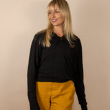 White Sands - Women's Long-Sleeve Hooded Henley in Obsidian (Black) (Front view)