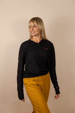 White Sands - Women's Long-Sleeve Hooded Henley in Obsidian (Black) (Front view)