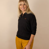 White Sands - Women's Long-Sleeve Hooded Henley in Obsidian (Black) (Front view)