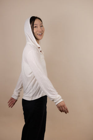 White Sands - Women's Long-Sleeve Hooded Henley in Desert Willow (White)(Side view with hood on)