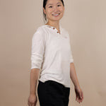 White Sands - Women's Long-Sleeve Hooded Henley in Desert Willow (White)(Side view)