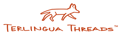 Logo of Terlingua Threads with two dogs and text on a black background